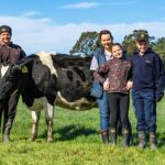 Dairy farmer tapping into deliveries