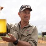 Tasmanian farmer Richard Gardner, left, is trialling asparagopsis seaweed for Fonterra in the hope it will reduce methane emissions. He is pictured with Sam Elsom from Tasmanian seaweed producer Sea Forest.