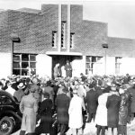 Field Day on the State Research Farm with people congregating at the School of Dairy Technology, later becoming the Gilbert Chandler Institute, 1950s.