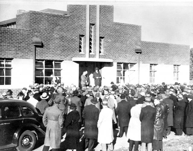 Field Day on the State Research Farm with people congregating at the School of Dairy Technology, later becoming the Gilbert Chandler Institute, 1950s.