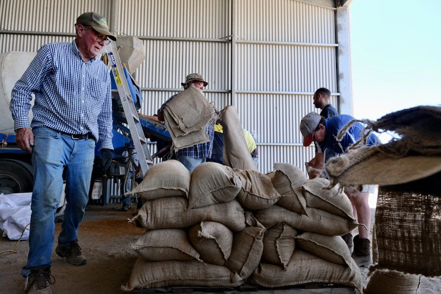 Residents have raced to fill sandbags and others have lent their cement trucks to speed up that process.