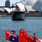 The Chinese and Australian national flags in Sydney, Australia. [Photo/Xinhua]