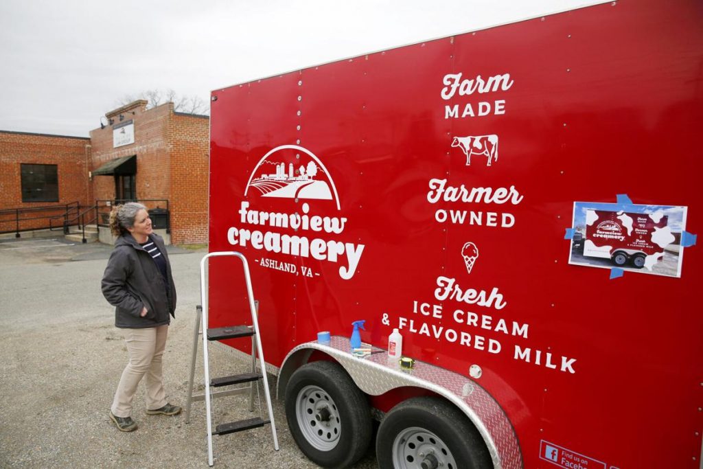 Missy Stanley checks out the new ice cream trailer for Farmview Creamery, which is set to open in May at White Oak Dairy in Ashland and run on Fridays and Saturdays to start. It will feature an inaugural menu of eight rotating flavors.