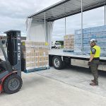 Anchor UHT milk being loaded at Fonterra depot in Hastings for delivery by road and air to Hawke’s Bay residents last week.