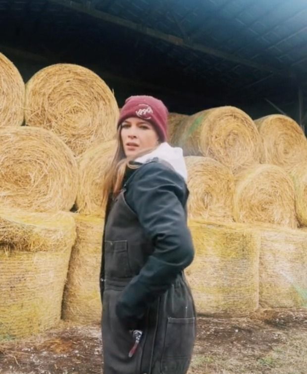 A sexy farmer in winter coverallsCredit: TikTok/@cowfarmer90