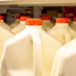 Several,Gallon,Size,Jugs,Of,Milk,In,The,Refrigerator,Section