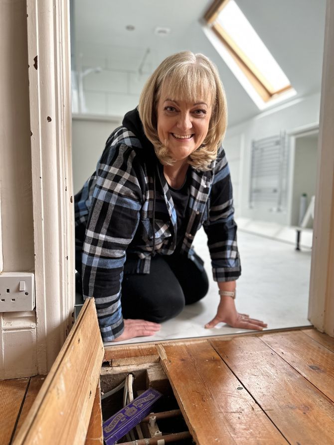 Woman Finds 100-Year-Old Dairy Milk Box Under Her Bathroom Floor1