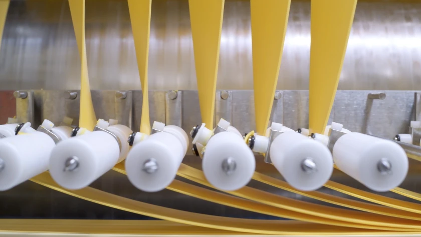 Ribbons of cheese fulfill orders of sliced cheese at the Norwood, Minnesota processing plant. 