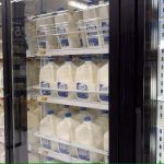 Lower milk prices in stores reflect lower prices being returned to farmers, according to one professor.