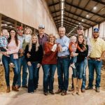 The Volleman family smiles for a photo at their dairy farm in Gustine. The family business now offers its glass-bottled milk in several businesses across East Texas.