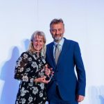 Minette Batters with awards host Hugh Dennis