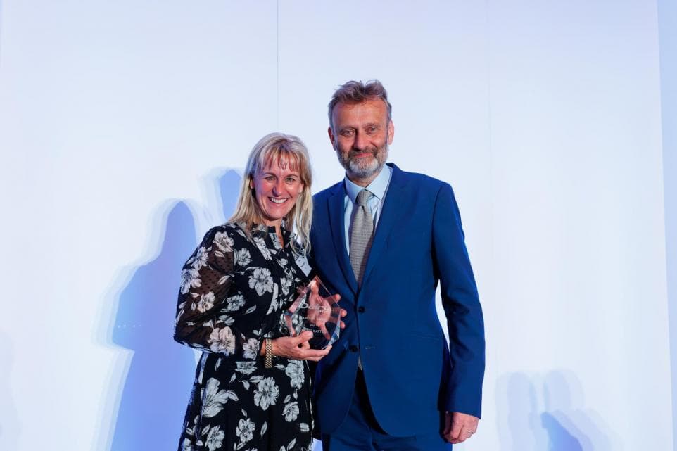 Minette Batters with awards host Hugh Dennis