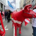 European dairy farmers wheel plaster cows through Brussels to demand 'fair' milk prices