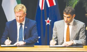 Trade Minister Todd McClay and his UAE counterpart the Minister of State for Foreign Trade Dr Thani bin Ahmed Al Zeyoudi in Wellington last year. Signed